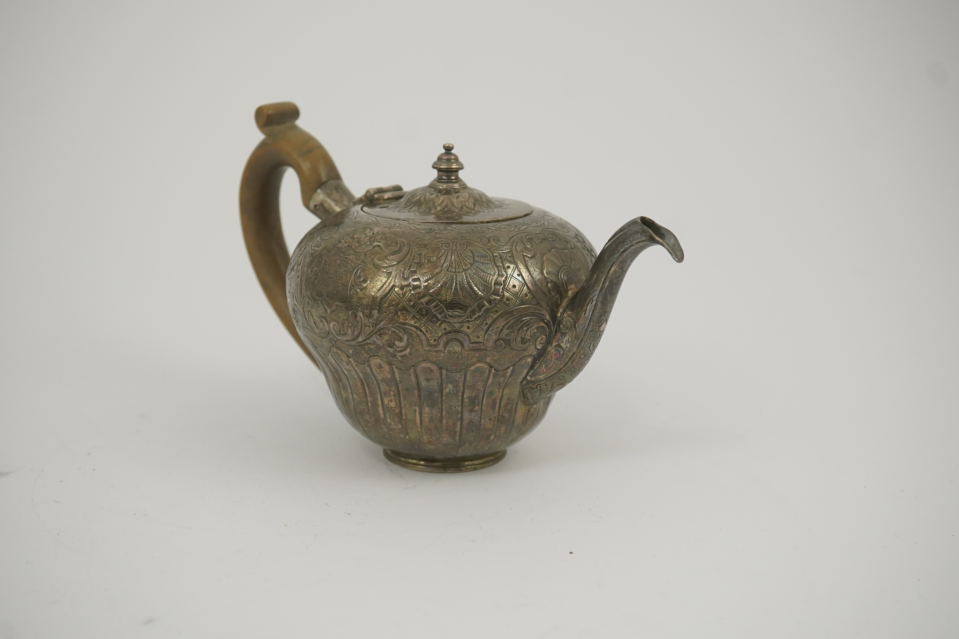 An 18th century Irish silver inverted pyriform bachelor's teapot, maker E.R